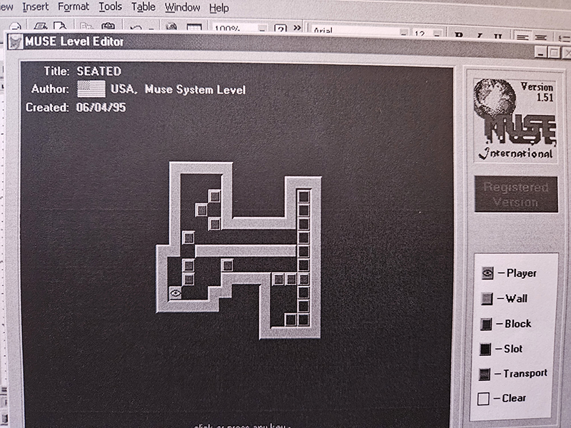 A scanned printout of an original Muse level from the 1990s,
                showing the board's walls, blocks and slots as printed marks on
                paper.